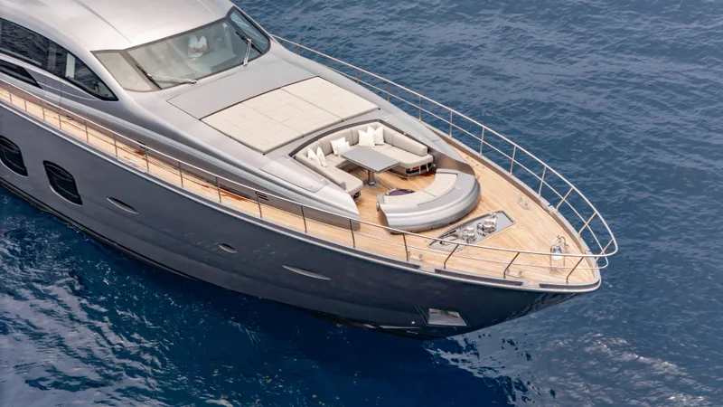  Yacht Photos Pics Luxurious 2021 Pershing 108 yacht with sleek design and spacious deck on blue ocean.