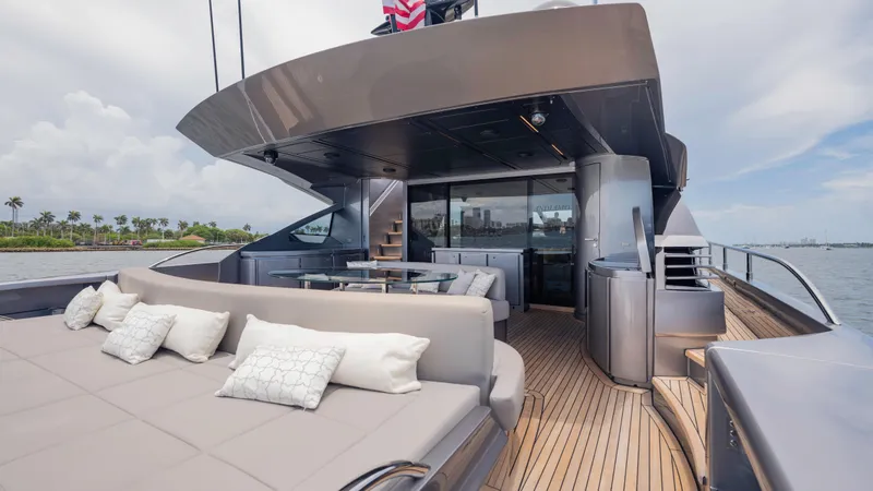  Yacht Photos Pics Luxurious 2021 Pershing 108 yacht deck with elegant seating and ocean view.