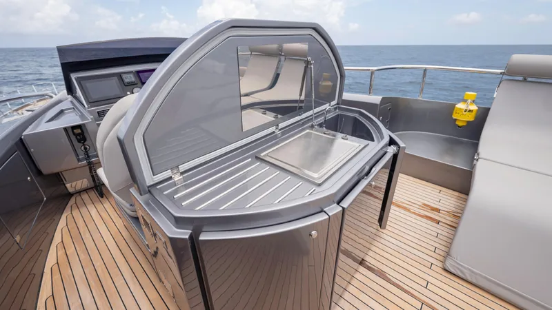 Yacht Photos Pics Luxury outdoor kitchen on 2021 Pershing 108 yacht with ocean view.