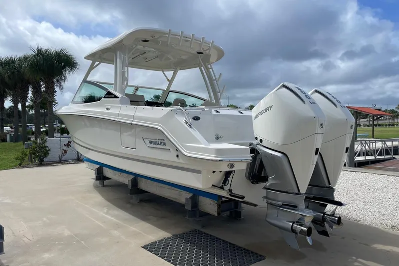 Only 88 Hours! Yacht Photos Pics 2023 Boston Whaler 280 Vantage boat with dual Mercury engines on display.