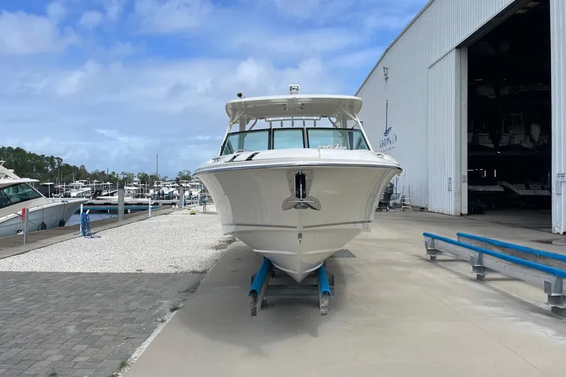 Only 88 Hours! Yacht Photos Pics 2023 Boston Whaler 280 Vantage boat at marina, front view, clear sky background.