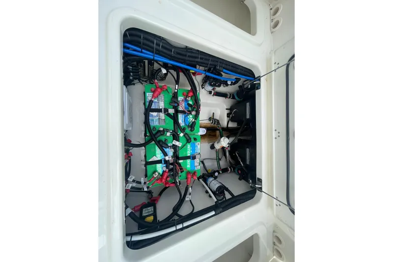 Only 88 Hours! Yacht Photos Pics 2023 Boston Whaler 280 Vantage boat battery compartment with wiring and components.