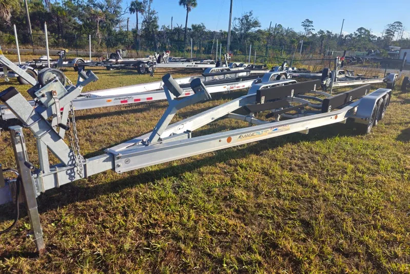 Only 88 Hours! Yacht Photos Pics Boat trailer for 2023 Boston Whaler 280 Vantage on grassy lot.