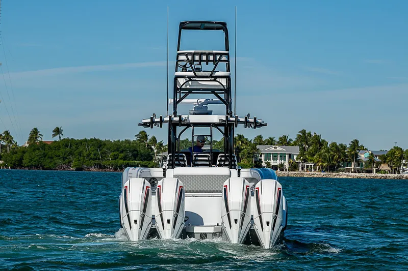  Yacht Photos Pics 2024 Costa Custom Boats 34 with four engines on the water.