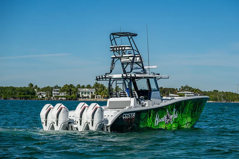  Yacht Photos Pics 2024 Costa Custom Boats 34 with four engines on open water.