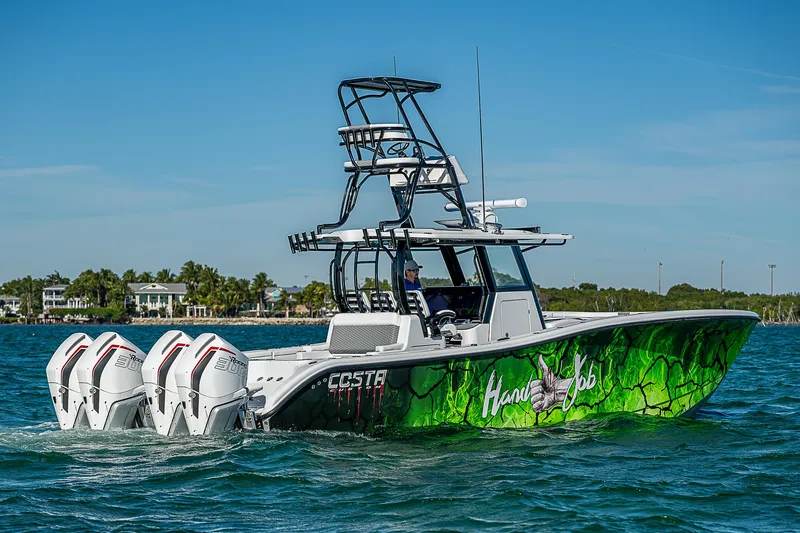  Yacht Photos Pics 2024 Costa Custom Boats 34 with vibrant green design and four powerful engines on the water.