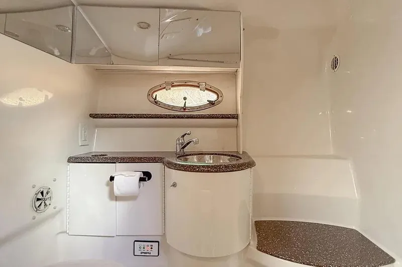 Gentleman's Legacy Yacht Photos Pics Luxurious bathroom interior of 2004 Formula 400 Super Sport Crossover yacht.