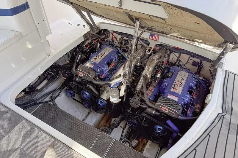 Gentleman's Legacy Yacht Photos Pics Twin engines in a 2004 Formula 400 Super Sport Crossover boat, engine compartment view.