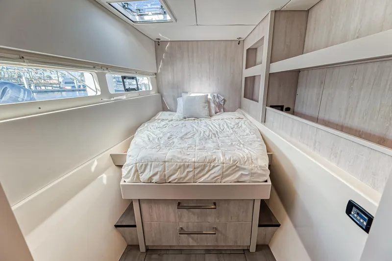 Aquarius Yacht Photos Pics Cozy bedroom in 2016 Leopard 58 yacht with modern design and natural light.