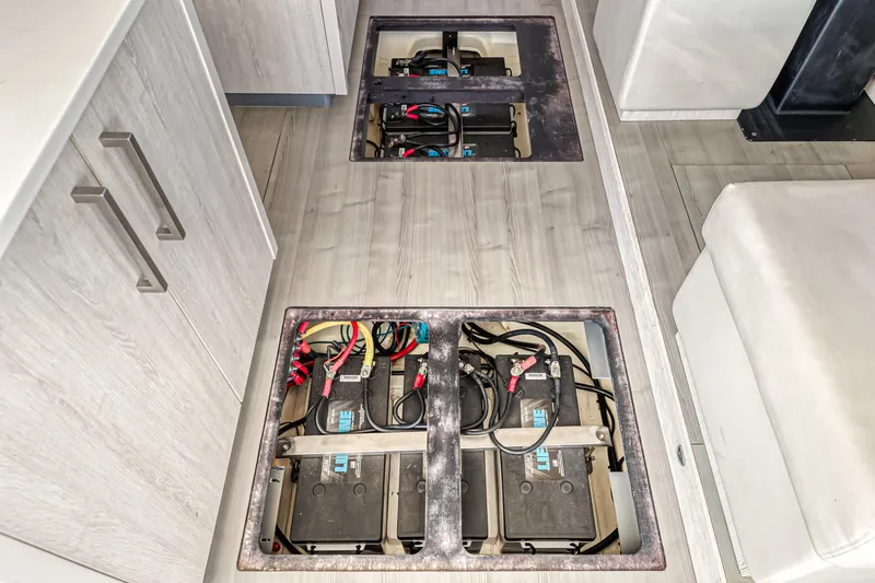 Aquarius Yacht Photos Pics Battery compartments in a 2016 Leopard 58 yacht, integrated into the floor.