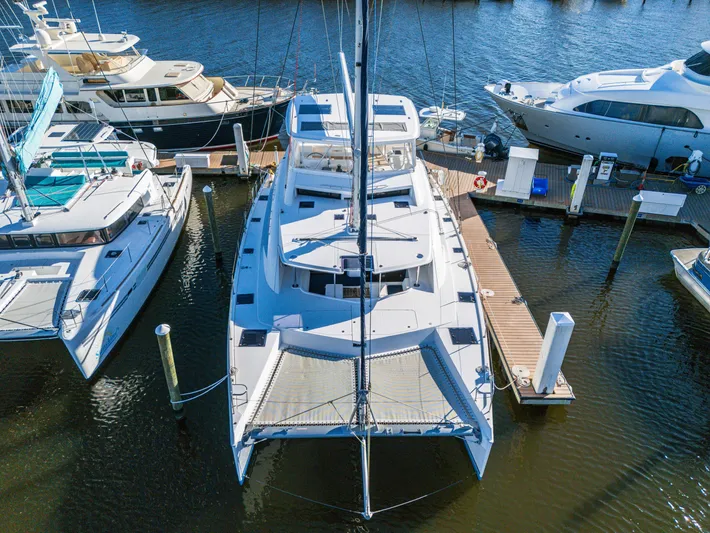 Aquarius Yacht Photos Pics Luxury Leopard 58 catamaran docked at marina, aerial view, 2016 model.