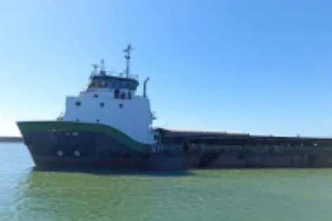  Yacht Photos Pics Custom Built Offshore Supply Vessel, 2011, navigating calm waters under a clear blue sky.