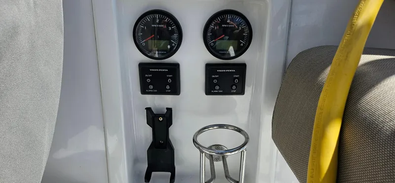 Night Out Yacht Photos Pics Control panel of 2023 Nautitech 44 Open catamaran with gauges and cup holder.