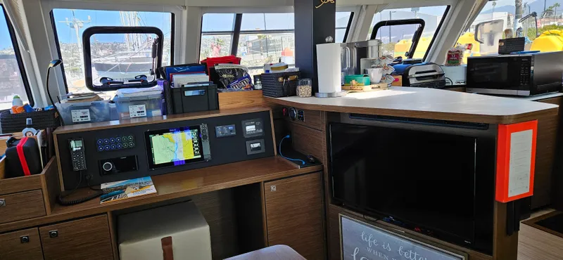 Night Out Yacht Photos Pics Interior of 2023 Nautitech 44 Open yacht with navigation equipment and modern amenities.