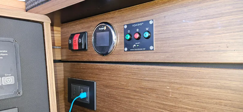 Night Out Yacht Photos Pics Control panel on 2023 Nautitech 44 Open yacht with switches and USB port.