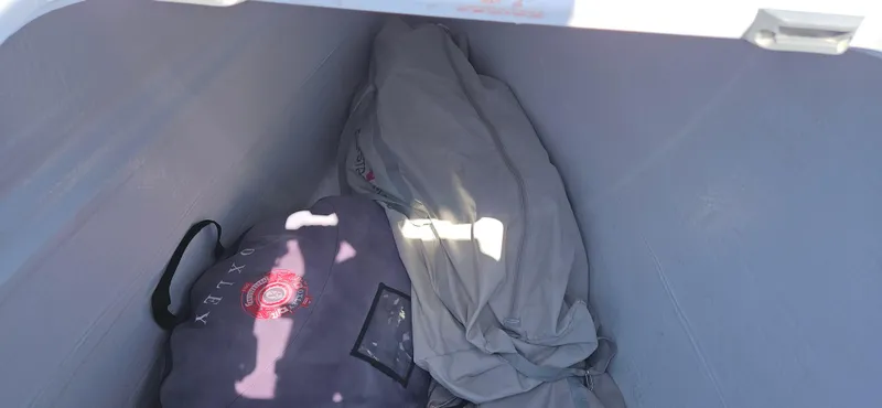 Night Out Yacht Photos Pics Storage compartment on 2023 Nautitech 44 Open, containing bags and equipment.