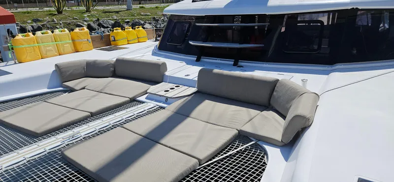 Night Out Yacht Photos Pics 2023 Nautitech 44 Open catamaran with comfortable outdoor seating and modern design.