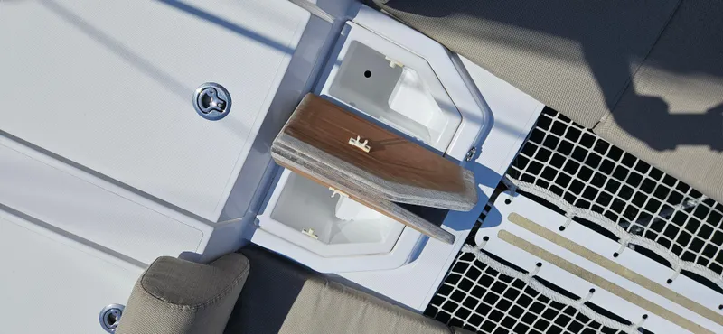 Night Out Yacht Photos Pics Deck detail of 2023 Nautitech 44 Open catamaran, featuring a wooden step and textured surface.