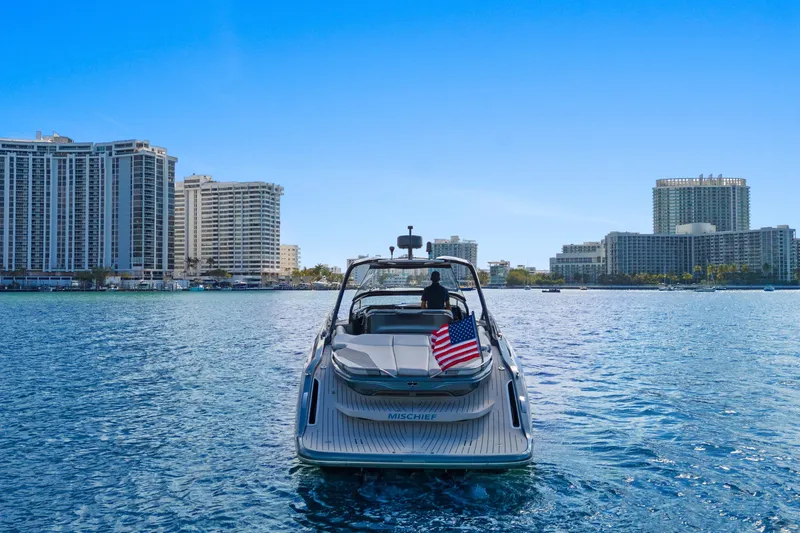  Yacht Photos Pics Luxury Princess R35 yacht cruising near city skyline, 2020 model.