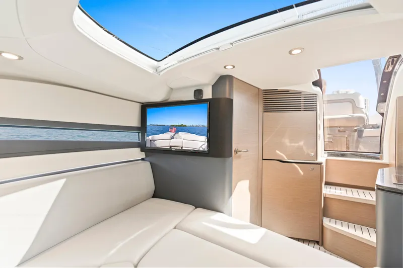  Yacht Photos Pics Luxurious interior of 2020 Princess R35 yacht with modern design and entertainment system.