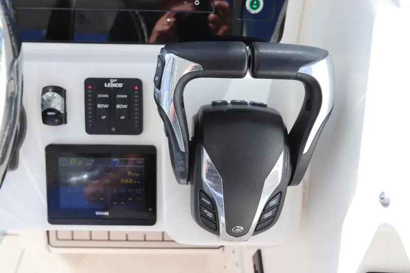  Yacht Photos Pics Edgewater 262CX Crossover 2021 boat controls with Yamaha throttle and Lenco trim tabs.