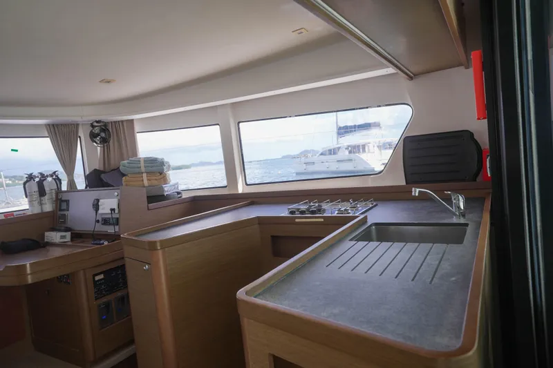 Apres Sail Yacht Photos Pics Interior of 2019 Lagoon 42 yacht with modern kitchen and ocean view.