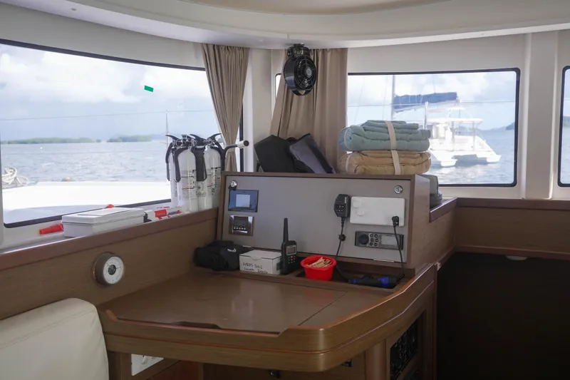 Apres Sail Yacht Photos Pics Interior of 2019 Lagoon 42 catamaran with navigation equipment and sea view.