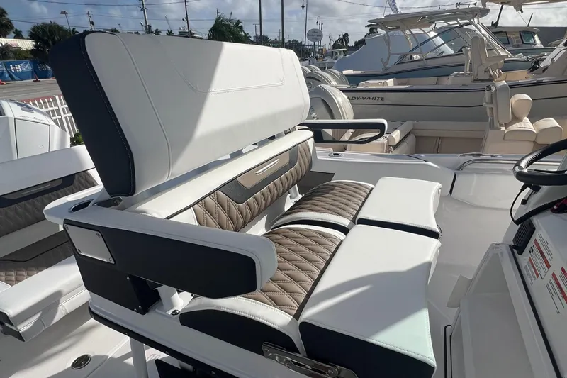 252-449 Yacht Photos Pics 2025 Blackfin 252 CC boat interior with luxurious seating and modern design.