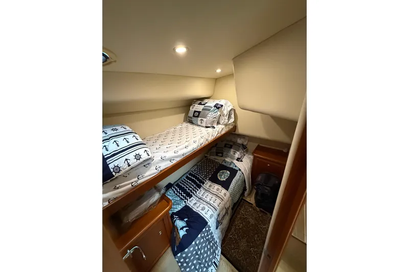  Yacht Photos Pics Cozy cabin with bunk beds in 2005 Riviera 40 Flybridge yacht.