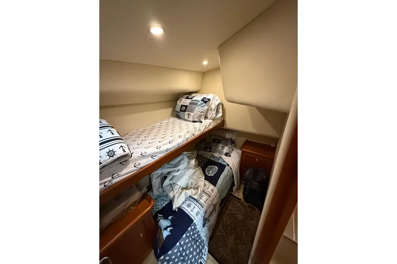  Yacht Photos Pics Cozy cabin with bunk beds in 2005 Riviera 40 Flybridge yacht.