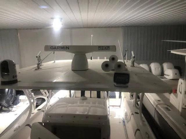  Yacht Photos Pics 2019 Midnight Express 39 Cuddy boat with Garmin radar in a storage facility.