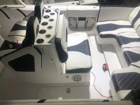  Yacht Photos Pics 2019 Midnight Express 39 Cuddy interior with luxurious seating and modern design.