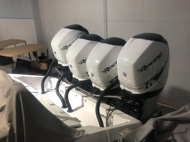  Yacht Photos Pics Four powerful outboard engines on a 2019 Midnight Express 39 Cuddy boat.