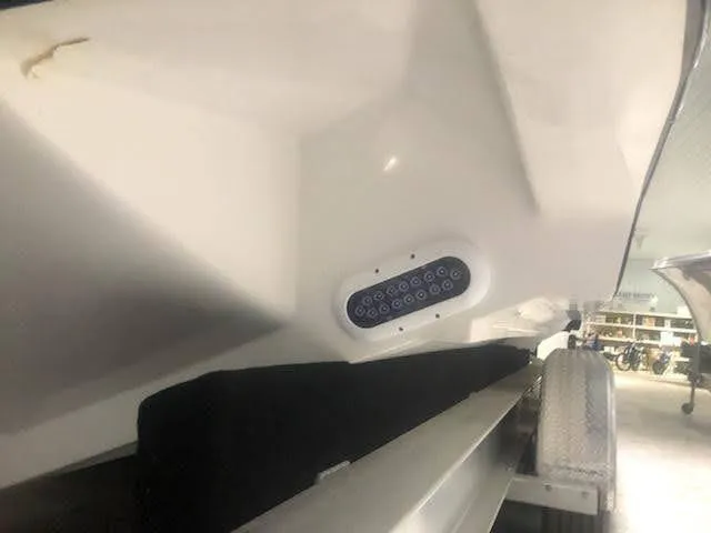  Yacht Photos Pics 2019 Midnight Express 39 Cuddy boat hull with LED lights on trailer.