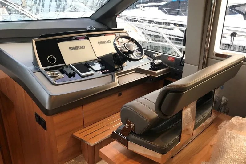 Alexstar Yacht Photos Pics Interior helm of 2021 Sunseeker Manhattan 68 yacht with modern navigation equipment.