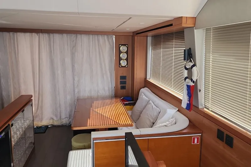 Alexstar Yacht Photos Pics Luxurious interior of 2021 Sunseeker Manhattan 68 yacht with elegant seating and decor.