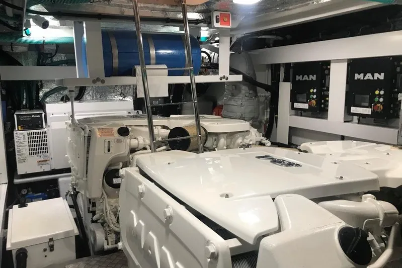 Alexstar Yacht Photos Pics Engine room of 2021 Sunseeker Manhattan 68 yacht with MAN engines and Cummins Onan generator.