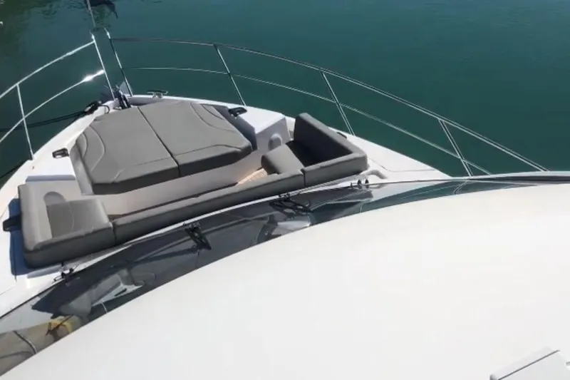 Alexstar Yacht Photos Pics 2021 Sunseeker Manhattan 68 yacht with sleek deck and luxurious seating.