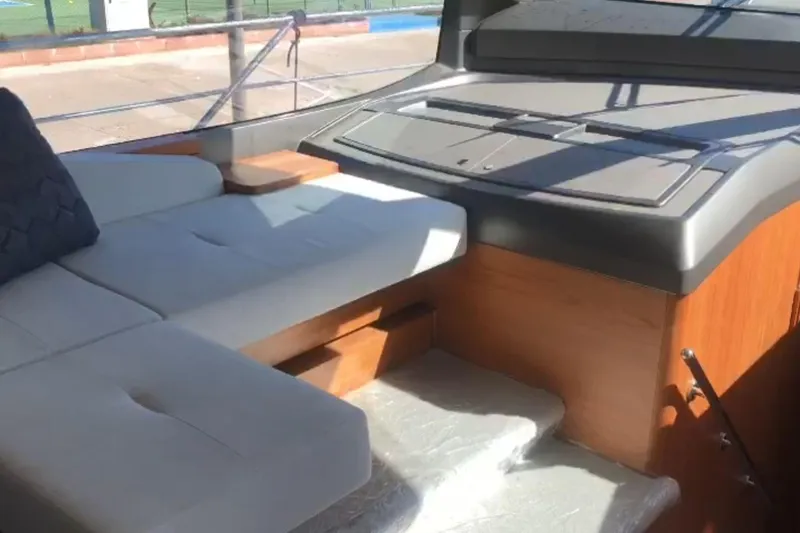 Alexstar Yacht Photos Pics Interior of 2021 Sunseeker Manhattan 68 yacht with modern seating and sleek design.