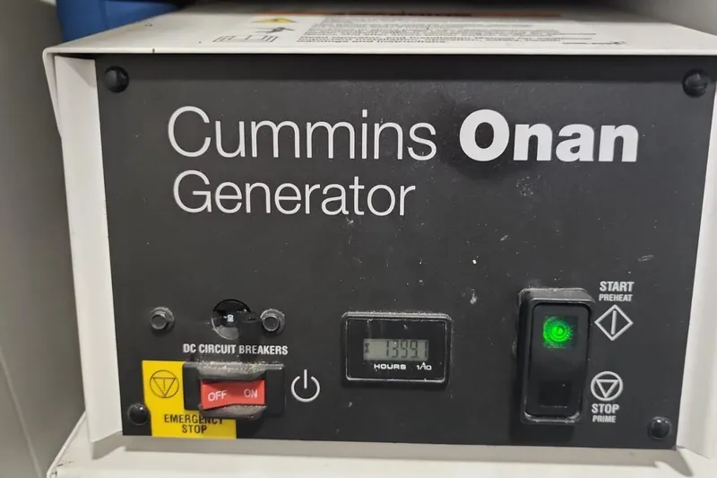 Alexstar Yacht Photos Pics Cummins Onan generator control panel on 2021 Sunseeker Manhattan 68 yacht.
