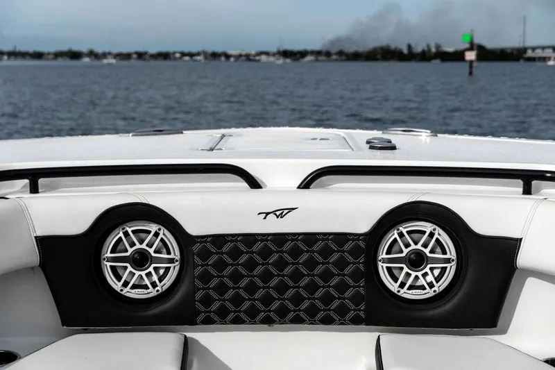 Tidewater 320 Cc Yacht Photos Pics Tidewater 32 boat interior with speakers, 2020 model, on a calm water body.