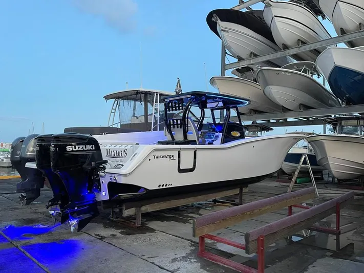 Tidewater 320 Cc Yacht Photos Pics 2020 Tidewater 32 boat with Suzuki engines in a marina storage.