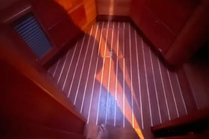 Off-line Yacht Photos Pics Teak flooring in 2002 Sabre 36 sailboat cabin interior.