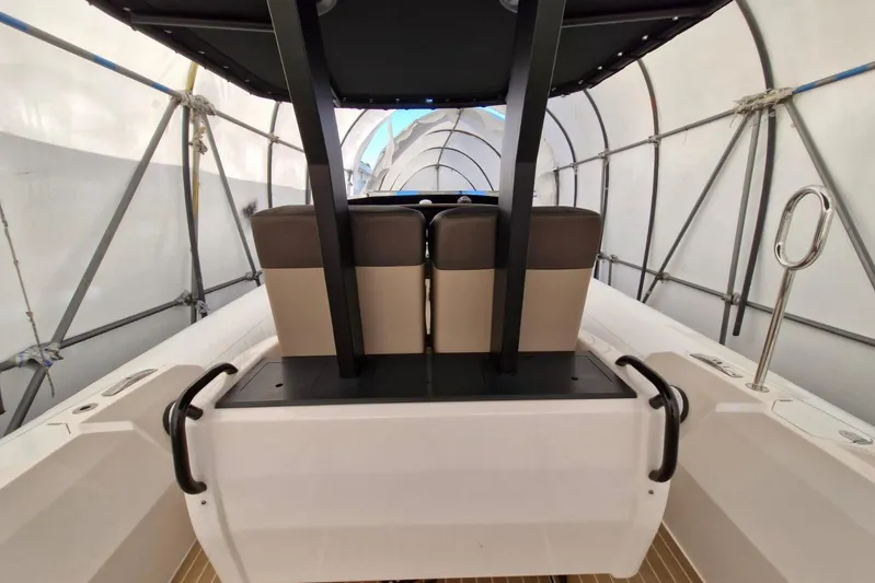 T/t Abie Yacht Photos Pics 2025 Rio Yachts Inagua 36 interior with seating and canopy in a covered area.