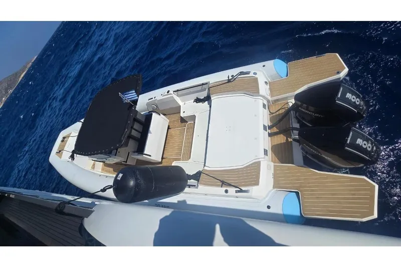 T/t Abie Yacht Photos Pics 2025 Rio Yachts Inagua 36 on blue ocean, featuring dual Mercury outboard engines.