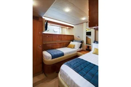 Ventus 21 Yacht Photos Pics 2003 Ferretti Yachts 760 cabin interior with twin beds and elegant wood finish.