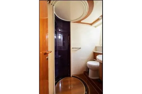 Ventus 21 Yacht Photos Pics Bathroom interior of 2003 Ferretti Yachts 760, featuring shower and toilet.