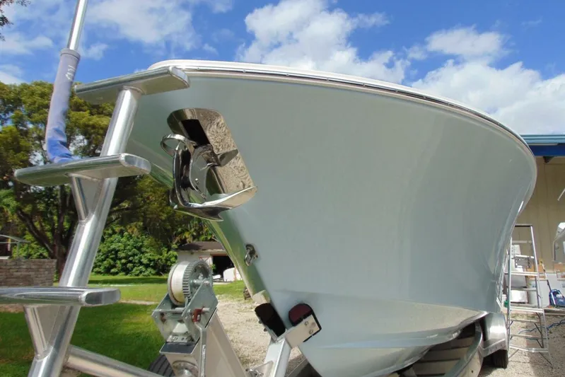 Incognito Yacht Photos Pics 2020 Invincible 36 Open boat on trailer, under clear blue sky.