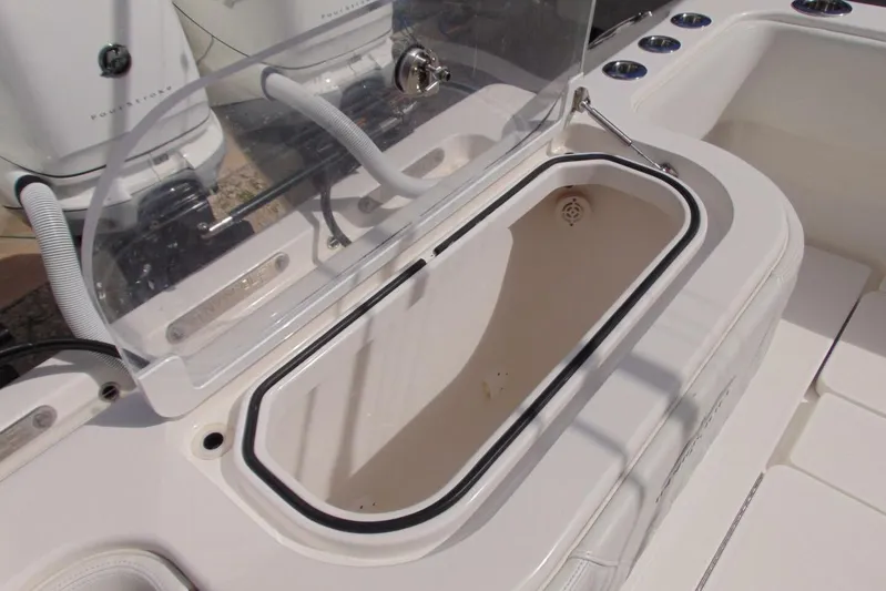 Incognito Yacht Photos Pics Open storage compartment on 2020 Invincible 36 Open boat, featuring sleek design and functionality.