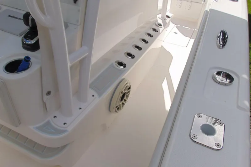 Incognito Yacht Photos Pics 2020 Invincible 36 Open boat interior with rod holders and speaker detail.